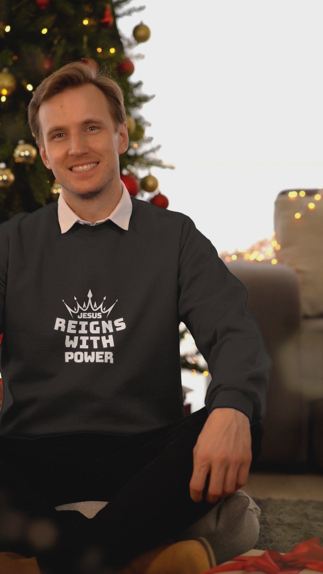 JESUS REIGNS WITH POWER UNISEX SWEATSHIRT
